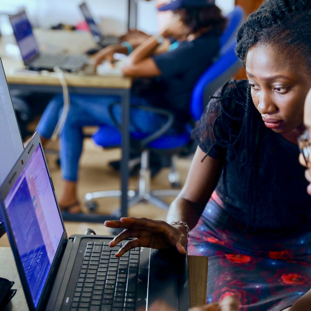 Stock photo of professional IT workers for an article about hiring IT professionals in Latin America.