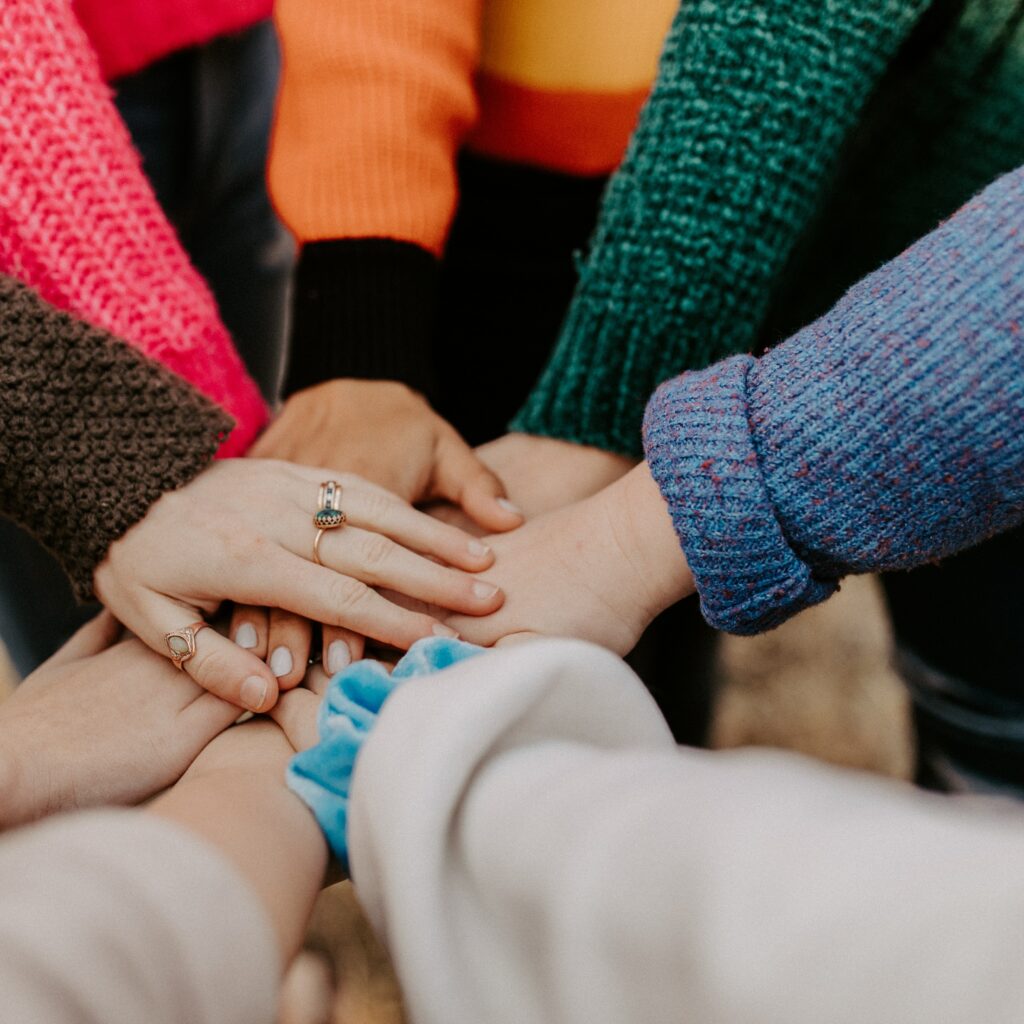 image from an image bank showing hands joined for an article on startups in Latin America